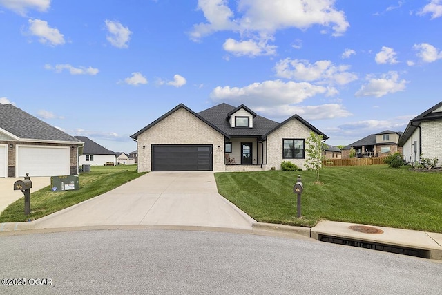 1528 N Edgemont Cir, Springfield, MO 65802 - view of front facade featuring brick siding, driveway, an attached garage, and a residential view
