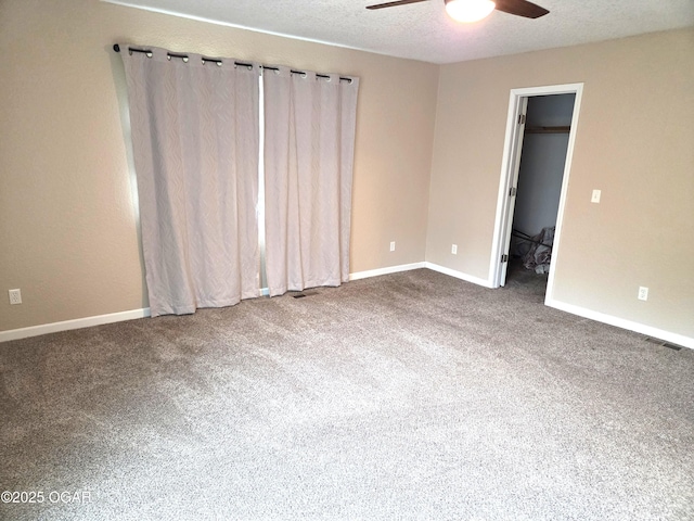 101 Van Hooser Blvd, Carl Junction, MO 64834 - carpeted spare room featuring ceiling fan, baseboards, and a textured ceiling