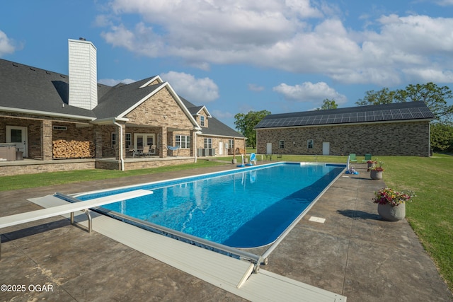 8740 County Road 241, Webb City, MO 64870 - swimming pool featuring a diving board, french doors, a patio, and a lawn