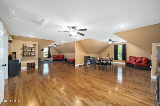 8740 County Road 241, Webb City, MO 64870 - bonus room with attic access, light wood-type flooring, a ceiling fan, vaulted ceiling, and baseboards