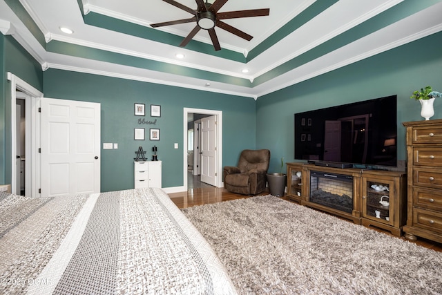 8740 County Road 241, Webb City, MO 64870 - bedroom featuring crown molding, a raised ceiling, wood finished floors, recessed lighting, and ceiling fan