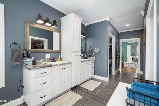8740 County Road 241, Webb City, MO 64870 - full bath featuring crown molding, baseboards, two vanities, recessed lighting, and tile patterned floors