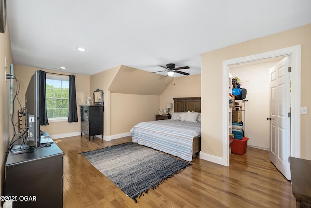 8740 County Road 241, Webb City, MO 64870 - bedroom featuring wood finished floors, baseboards, ceiling fan, recessed lighting, and lofted ceiling