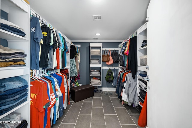 8740 County Road 241, Webb City, MO 64870 - spacious closet with dark tile patterned flooring