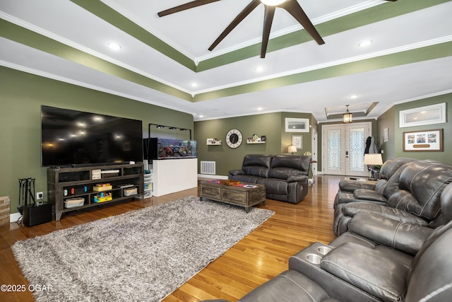 8740 County Road 241, Webb City, MO 64870 - living area featuring a ceiling fan, wood finished floors, and ornamental molding