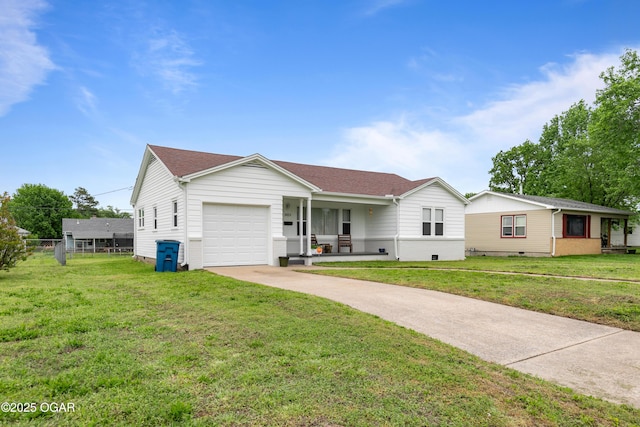 ranch-style home with concrete driveway, a garage, a front yard, a porch, and crawl space