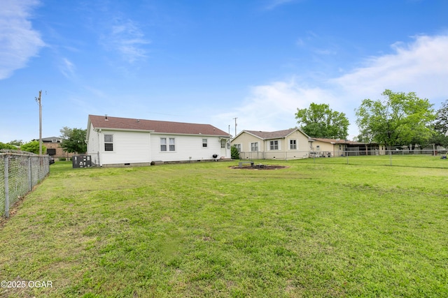rear view of house with crawl space