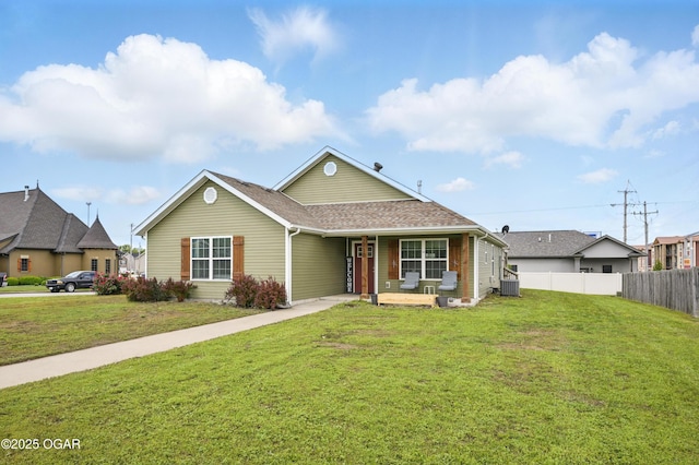 view of front of property featuring a porch, central AC unit, and roof with shingles