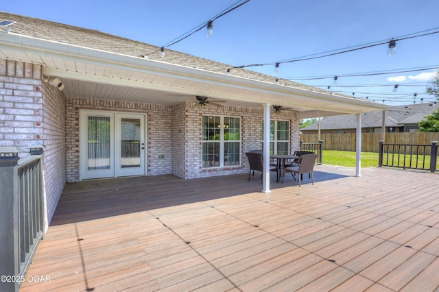 1020 S Florida Ave, Joplin, MO 64801 - wooden deck with ceiling fan and outdoor dining space