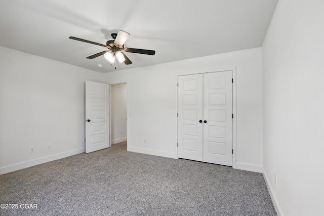 1020 S Florida Ave, Joplin, MO 64801 - unfurnished bedroom with carpet flooring, baseboards, a ceiling fan, and a closet