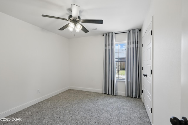 1020 S Florida Ave, Joplin, MO 64801 - carpeted spare room with a ceiling fan and baseboards