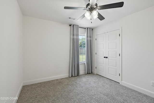 1020 S Florida Ave, Joplin, MO 64801 - unfurnished bedroom featuring carpet, baseboards, ceiling fan, and a closet