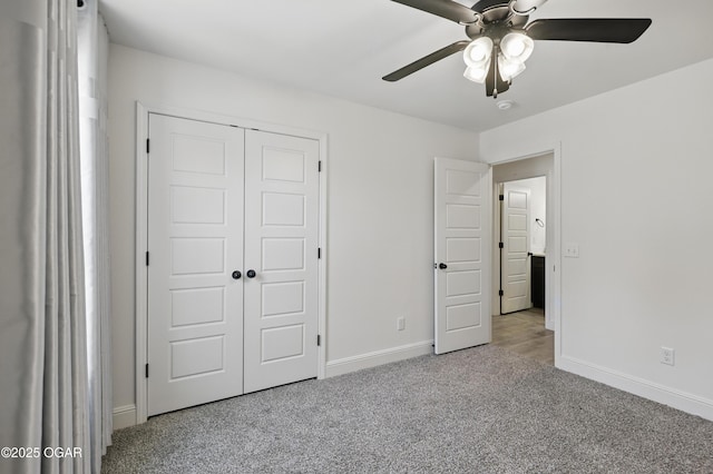 1020 S Florida Ave, Joplin, MO 64801 - unfurnished bedroom with carpet floors, baseboards, a closet, and a ceiling fan