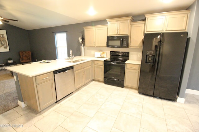 2102 Birdie Ln, Neosho, MO 64850 - kitchen featuring black appliances, a peninsula, ceiling fan, light countertops, and open floor plan