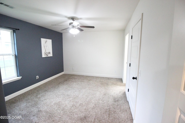 2102 Birdie Ln, Neosho, MO 64850 - carpeted spare room with a ceiling fan and baseboards