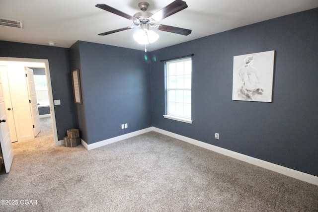2102 Birdie Ln, Neosho, MO 64850 - spare room with ceiling fan and carpet flooring
