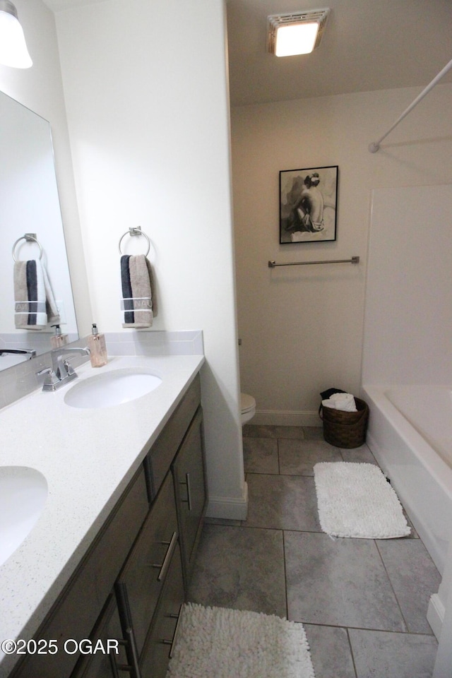 2102 Birdie Ln, Neosho, MO 64850 - full bathroom featuring double vanity, tile patterned flooring, and tub / shower combination
