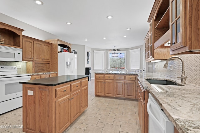 10208 Timberline Cir, Joplin, MO 64804 - kitchen with white appliances, open shelves, a sink, recessed lighting, and tasteful backsplash
