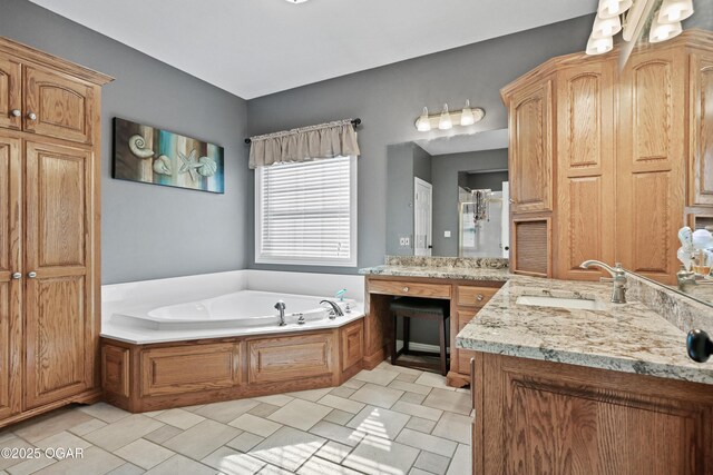 10208 Timberline Cir, Joplin, MO 64804 - bathroom with a garden tub and two vanities