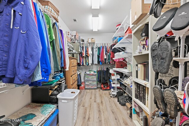 10208 Timberline Cir, Joplin, MO 64804 - spacious closet featuring wood finished floors
