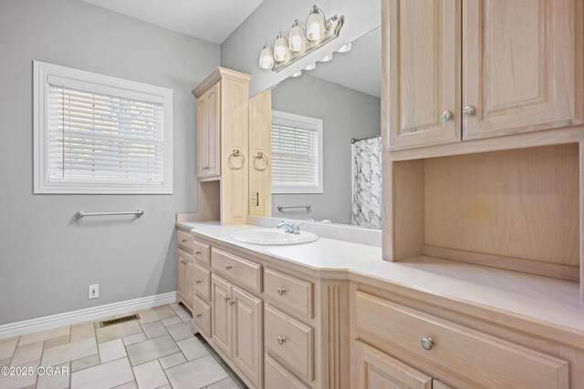 10208 Timberline Cir, Joplin, MO 64804 - bathroom with vanity and baseboards