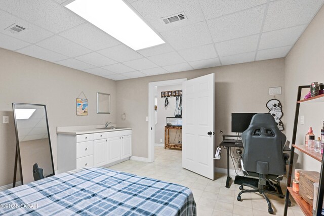 10208 Timberline Cir, Joplin, MO 64804 - bedroom featuring a paneled ceiling, baseboards, and an office area