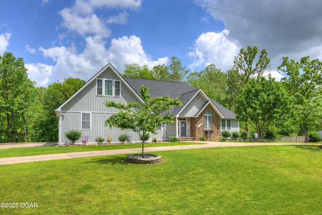 10208 Timberline Cir, Joplin, MO 64804 - view of front facade featuring a front yard, board and batten siding, and roof with shingles