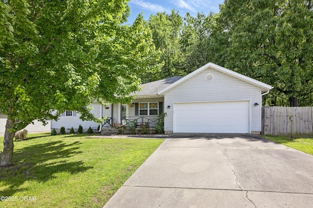 view of front of house featuring an attached garage, driveway, and covered porch