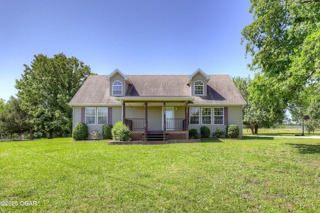 14266 Burr Oak Rd, Carthage, MO 64836 - cape cod-style house featuring a porch, a front lawn, and a shingled roof