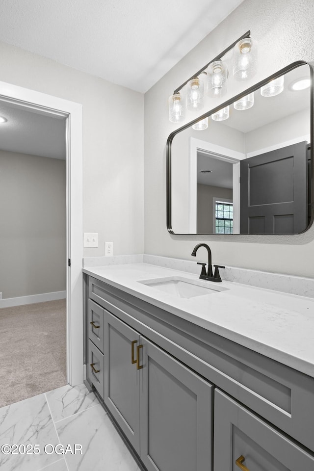 5554 Riverside Dr, Joplin, MO 64804 - bathroom with vanity and marble look tile flooring