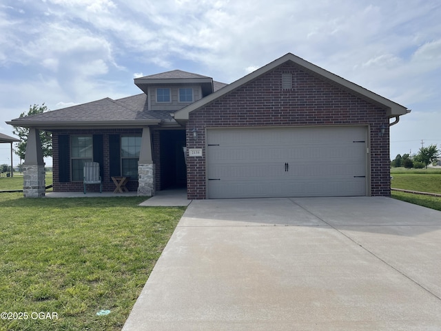 view of front facade with a front lawn, concrete driveway, a garage, and brick siding