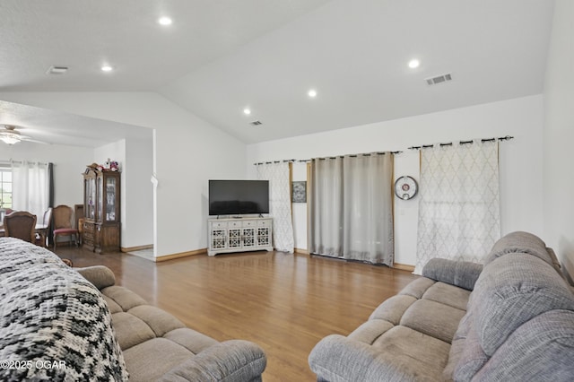 21103 Colt Ln, Diamond, MO 64840 - living area with vaulted ceiling, wood finished floors, ceiling fan, recessed lighting, and baseboards