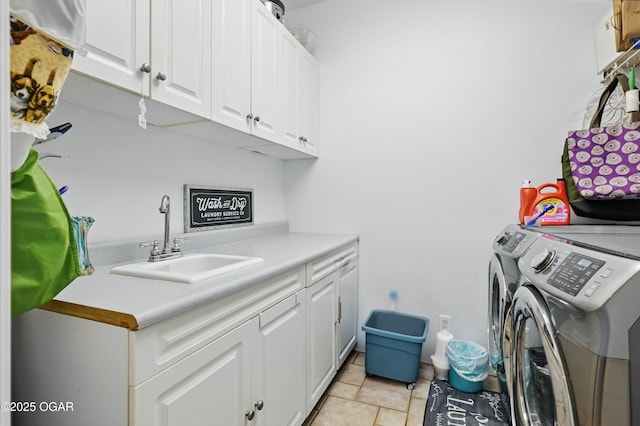 21103 Colt Ln, Diamond, MO 64840 - laundry area featuring separate washer and dryer and cabinet space