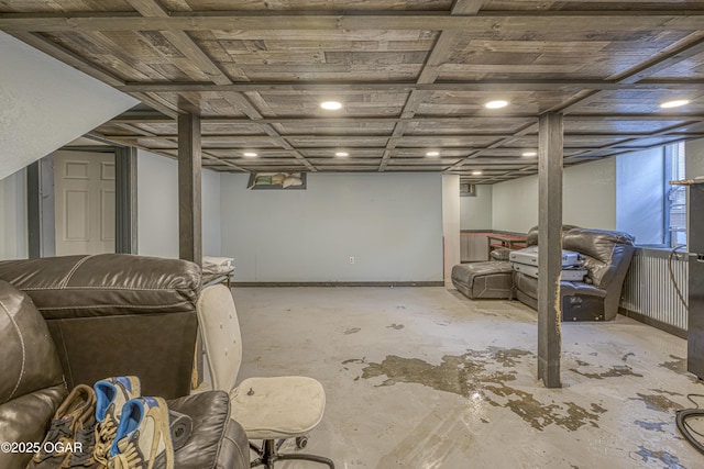finished basement featuring recessed lighting
