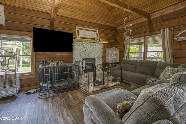 living room with wood walls, wooden ceiling, hardwood / wood-style flooring, beamed ceiling, and high vaulted ceiling