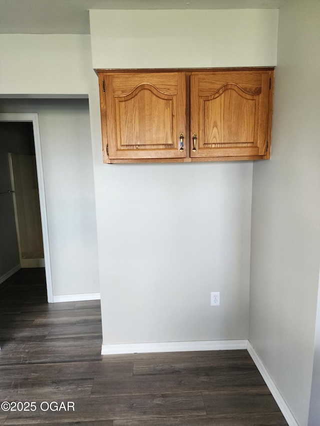208 NW 10th Rd, Lamar, MO 64759 - detailed view of wood finished floors and baseboards