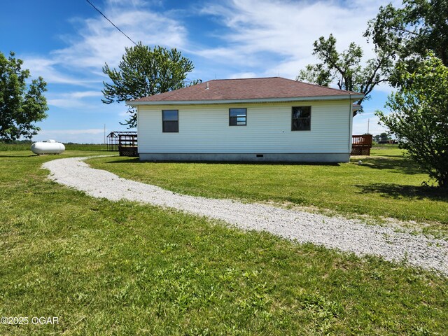 208 NW 10th Rd, Lamar, MO 64759 - view of home's exterior with a lawn
