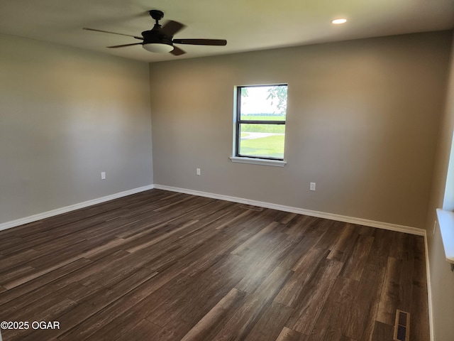 208 NW 10th Rd, Lamar, MO 64759 - unfurnished room featuring dark wood finished floors, ceiling fan, baseboards, and recessed lighting