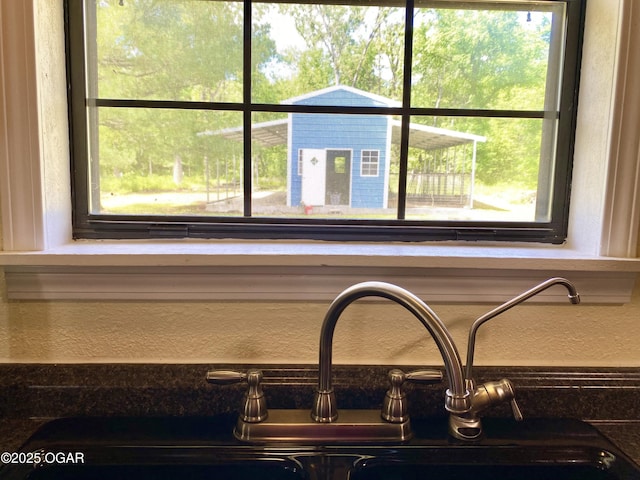 21522 Old Ritchey Rd, Granby, MO 64844 - kitchen view of a sink and a textured wall