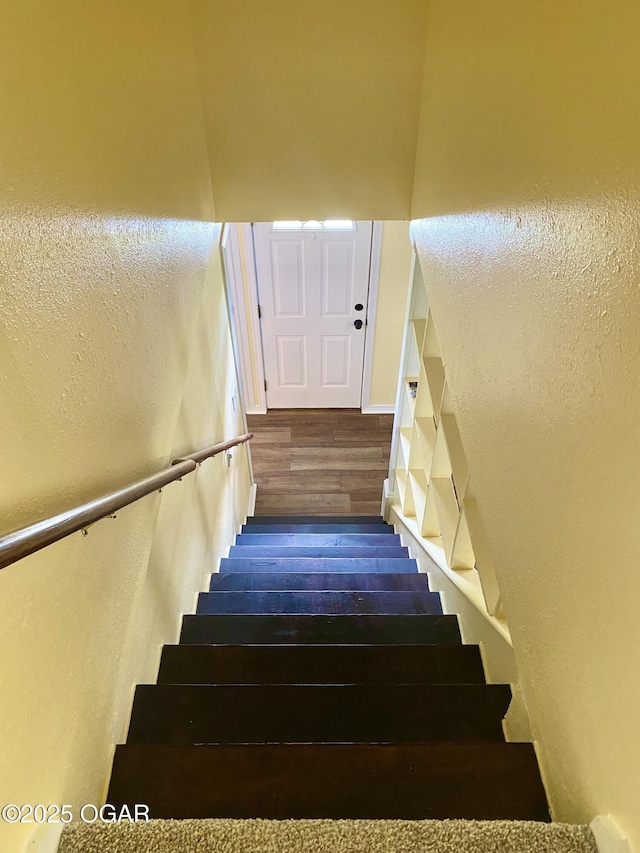 21522 Old Ritchey Rd, Granby, MO 64844 - stairs featuring wood finished floors and a textured wall