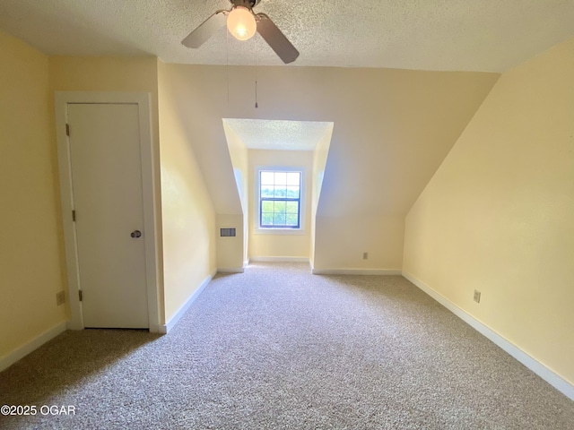 21522 Old Ritchey Rd, Granby, MO 64844 - bonus room with carpet floors, a textured ceiling, ceiling fan, and baseboards