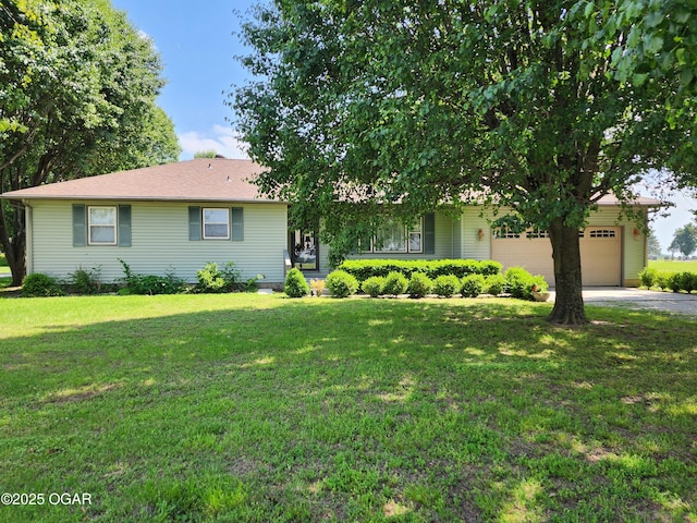 600 W Mercer, Jasper, MO 64755 - view of front of home featuring an attached garage, a front lawn, and concrete driveway