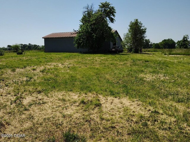 6468 Dogwood Rd, Reeds, MO 64859 - view of yard with an outbuilding