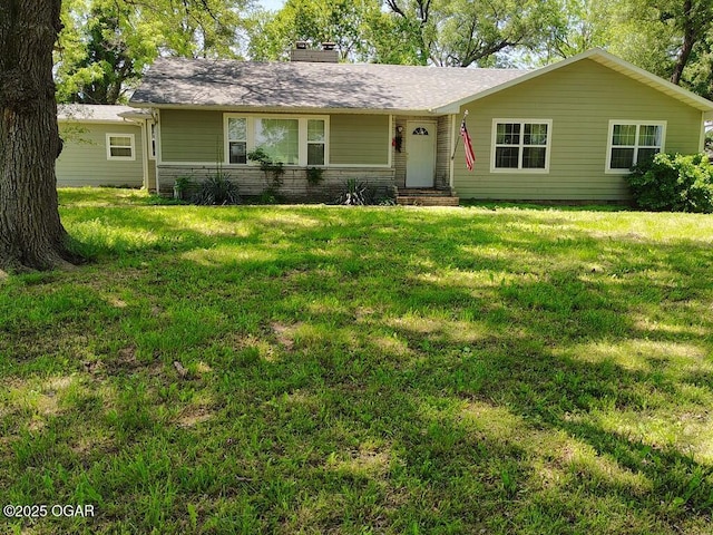 6468 Dogwood Rd, Reeds, MO 64859 - single story home with a front lawn and a chimney