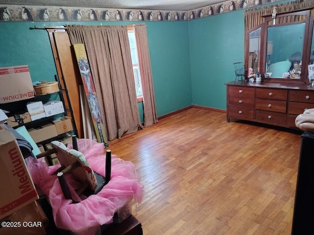 6468 Dogwood Rd, Reeds, MO 64859 - office area with wood finished floors and a textured ceiling