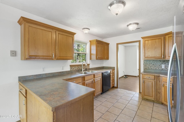 9969 Lawrence Unit 2222, Monett, MO 65708 - kitchen with a sink, black dishwasher, tasteful backsplash, a peninsula, and light tile patterned floors