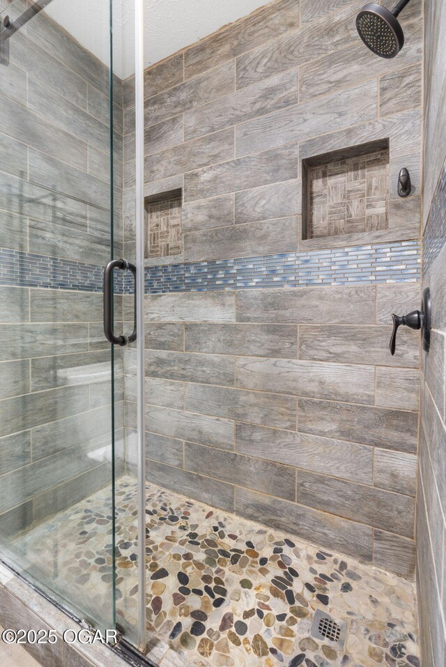 9969 Lawrence Unit 2222, Monett, MO 65708 - bathroom featuring a stall shower