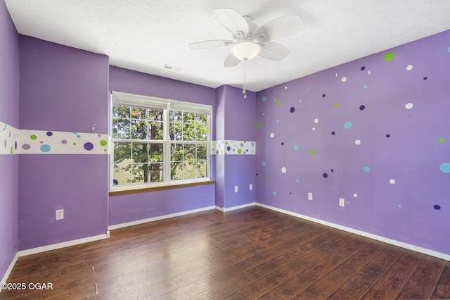 9969 Lawrence Unit 2222, Monett, MO 65708 - empty room featuring wood finished floors, ceiling fan, baseboards, and a textured ceiling