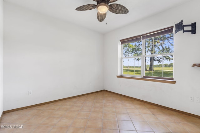 9969 Lawrence Unit 2222, Monett, MO 65708 - unfurnished room featuring a ceiling fan, baseboards, and light tile patterned floors