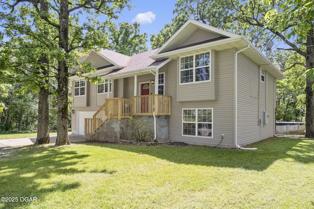 9969 Lawrence Unit 2222, Monett, MO 65708 - view of front of home featuring a front lawn and a garage